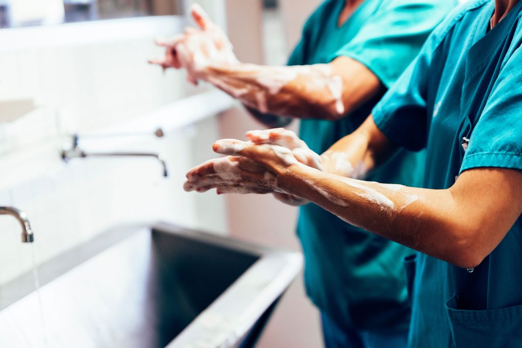 Health professionals washing hands